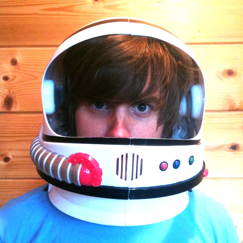 Brad Frost wearing a toy astronaut helmet